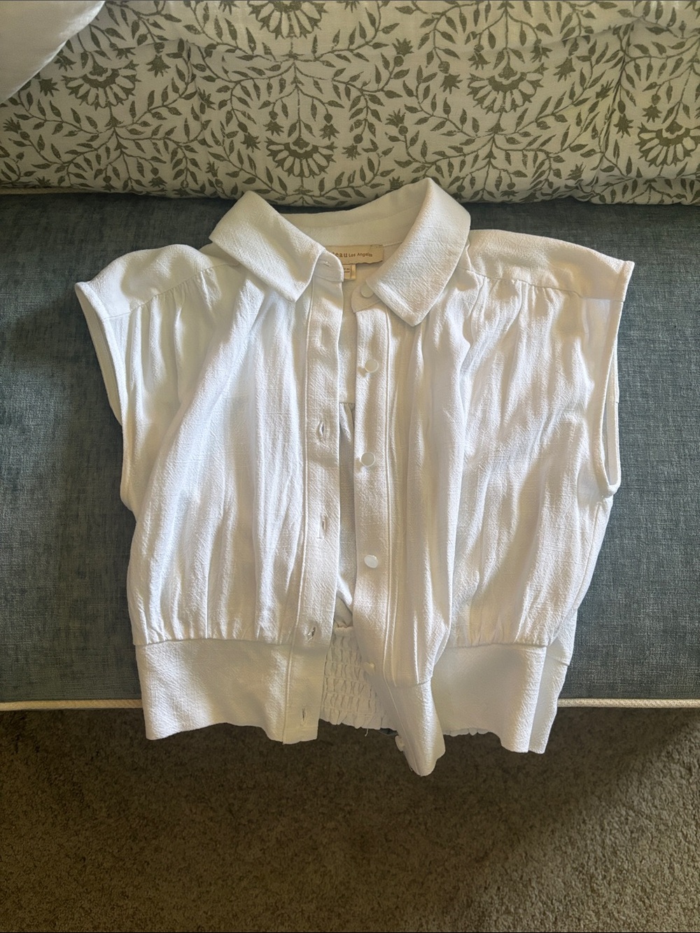 Crisp White Textured Sleeveless Button-Up Top